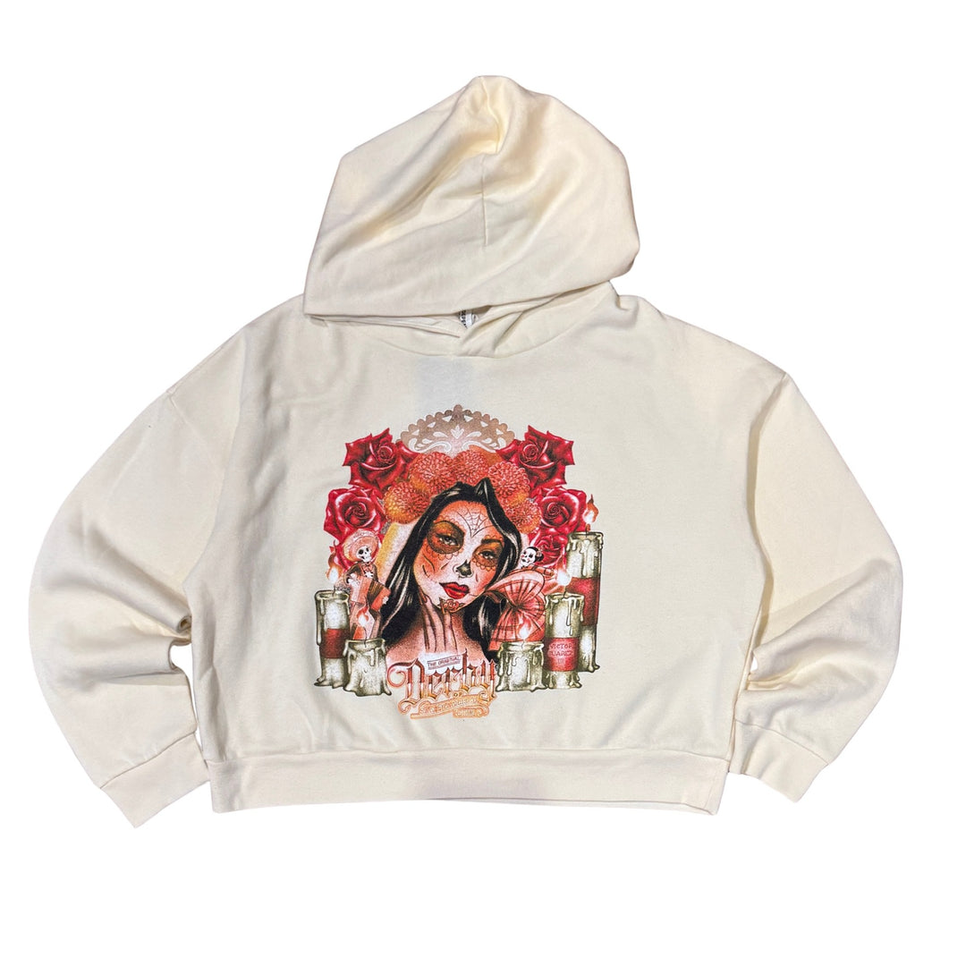 Beige hoodie with a graphic design of a woman with flowers and candles on a white background