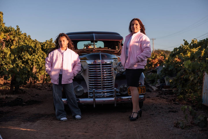 mom and daughter wearing the cotton pink jacket