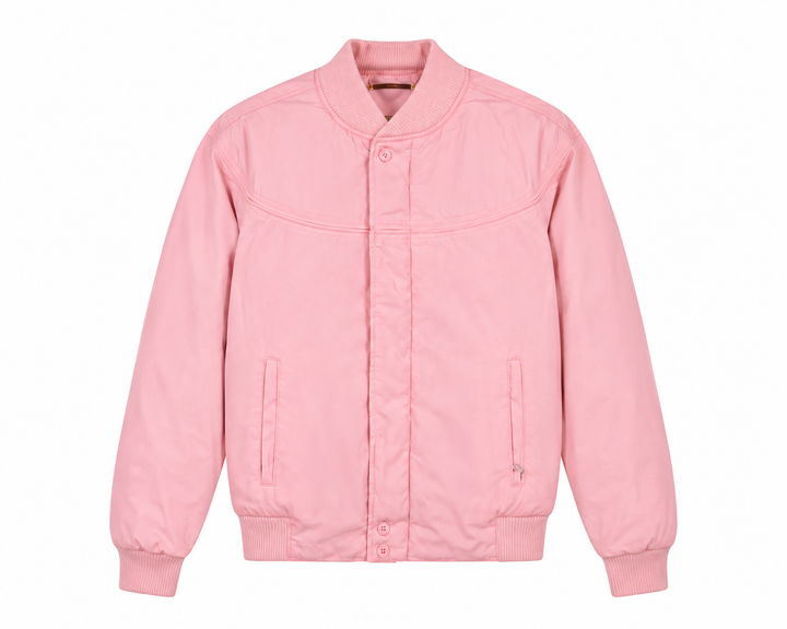 A light pink quilted bomber jacket with a ribbed collar, cuffs, and hem, featuring a button-front closure and two vertical welt pockets on the chest, shown against a plain white background.