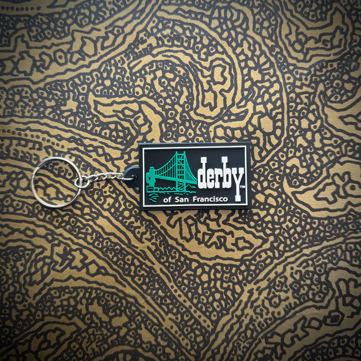BLACK BACKGROUND, GREEN BRIDGE , WHITE LETTER PLASTIC KEYCHAINS 